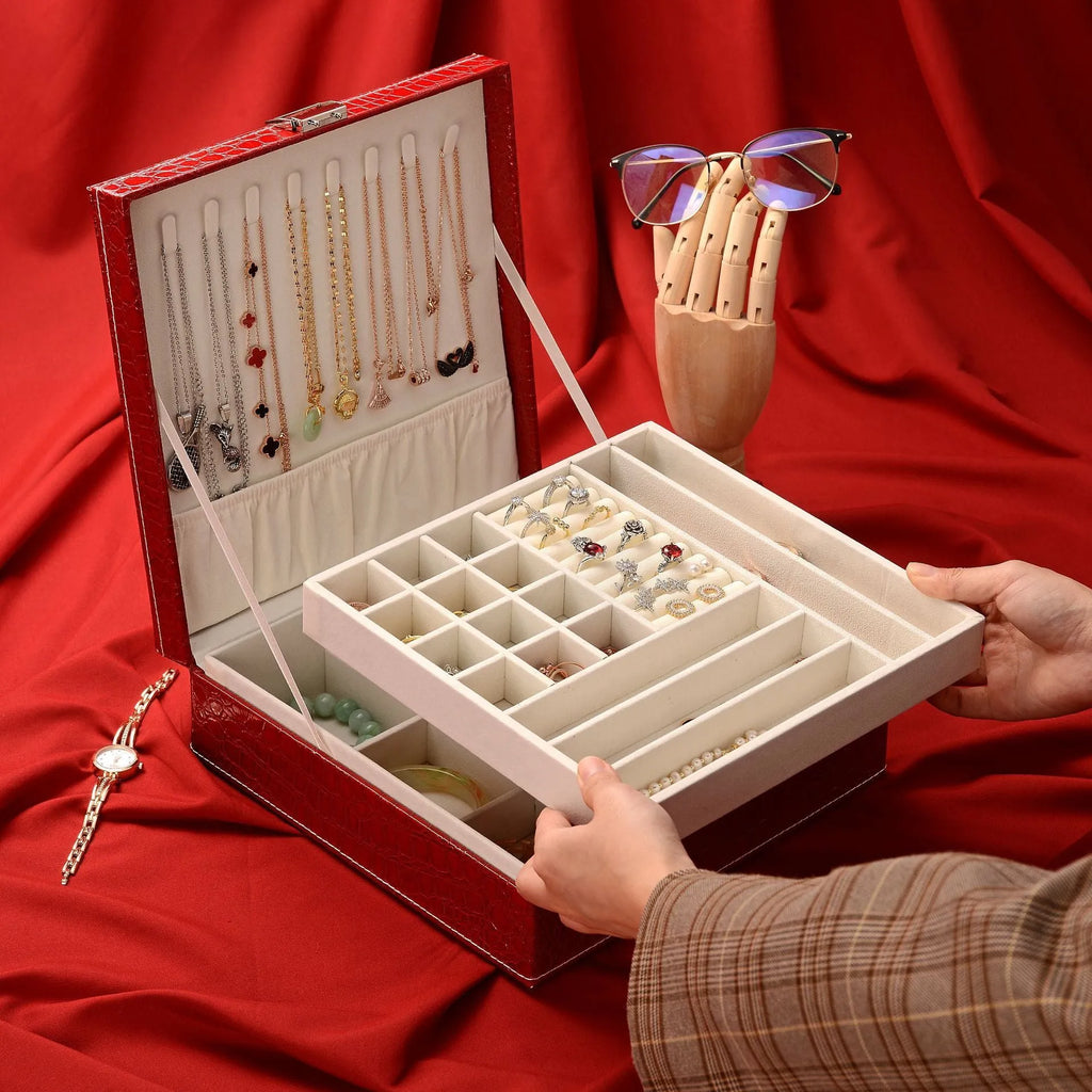 Green crocodile pattern leather double layer jewelry box with lock, showing interior compartments