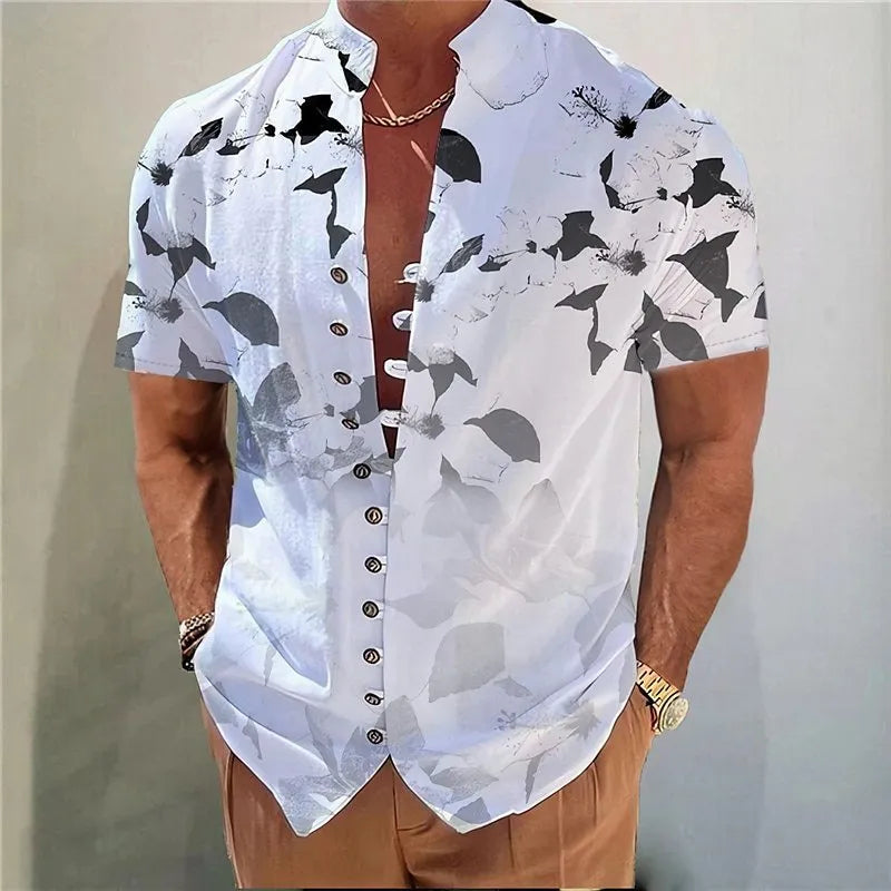 Youth wearing a short sleeve cardigan with a blue and white 3D geometric floral print pattern.