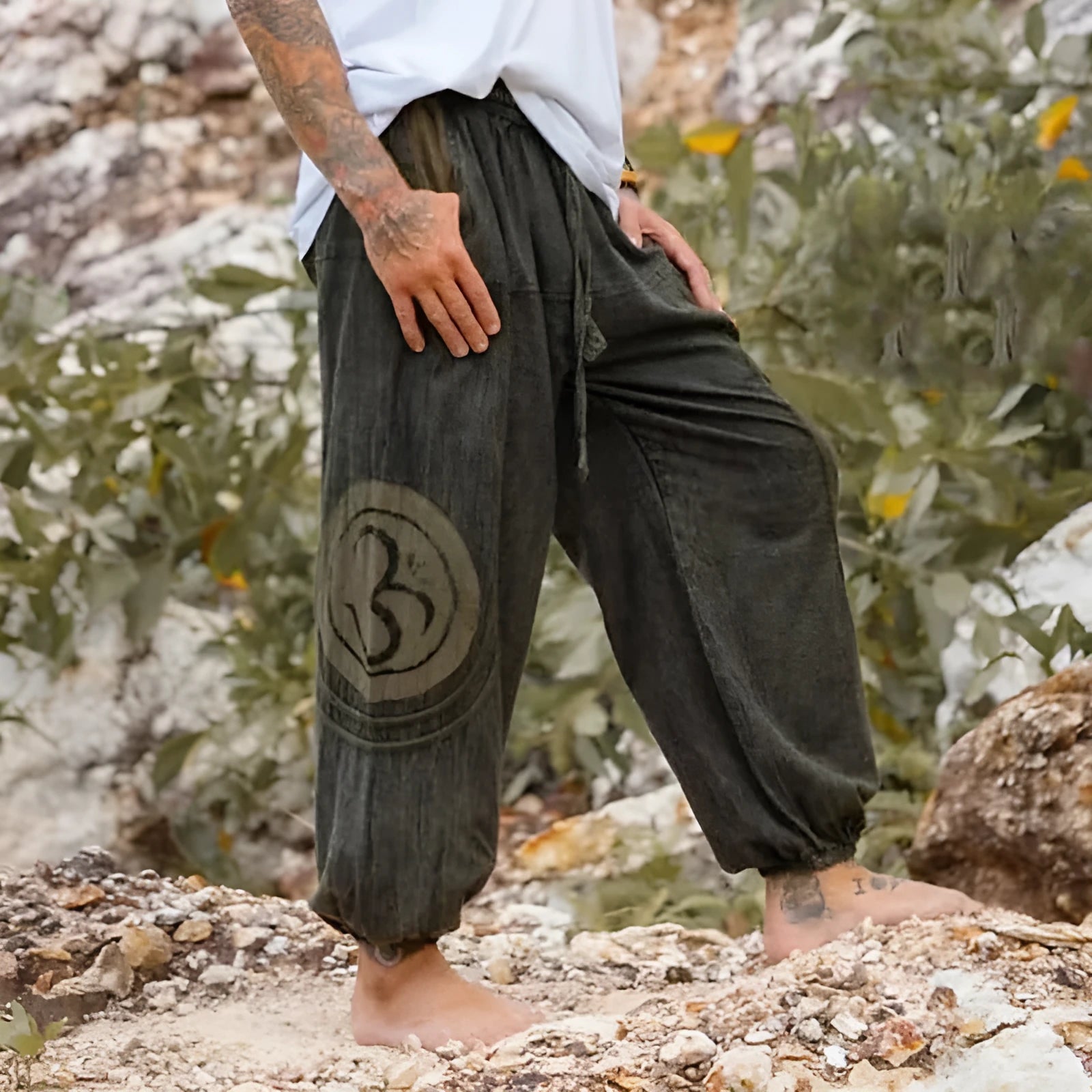 Men's dark green ethnic pattern trousers with ankle-tied design on mid waist