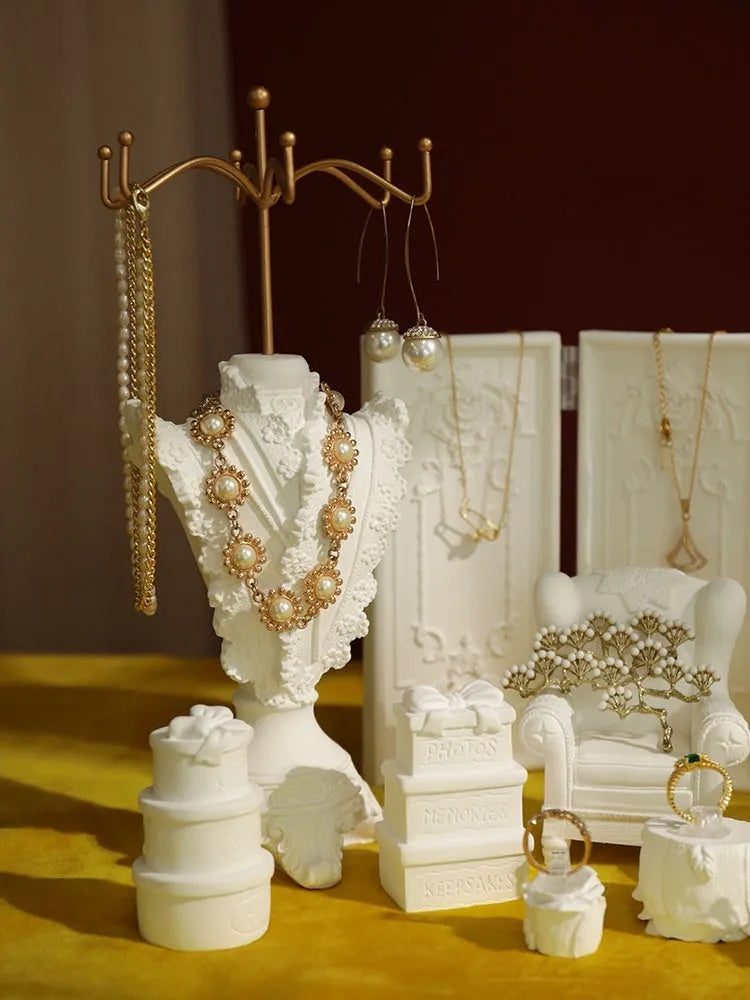 White plaster three-layer gypsum jewellery display stand with retro shape for necklaces and rings