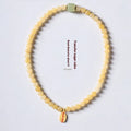Hand-woven women's topaz bracelet with 6mm mantra barrel beads and square sugar jade pieces