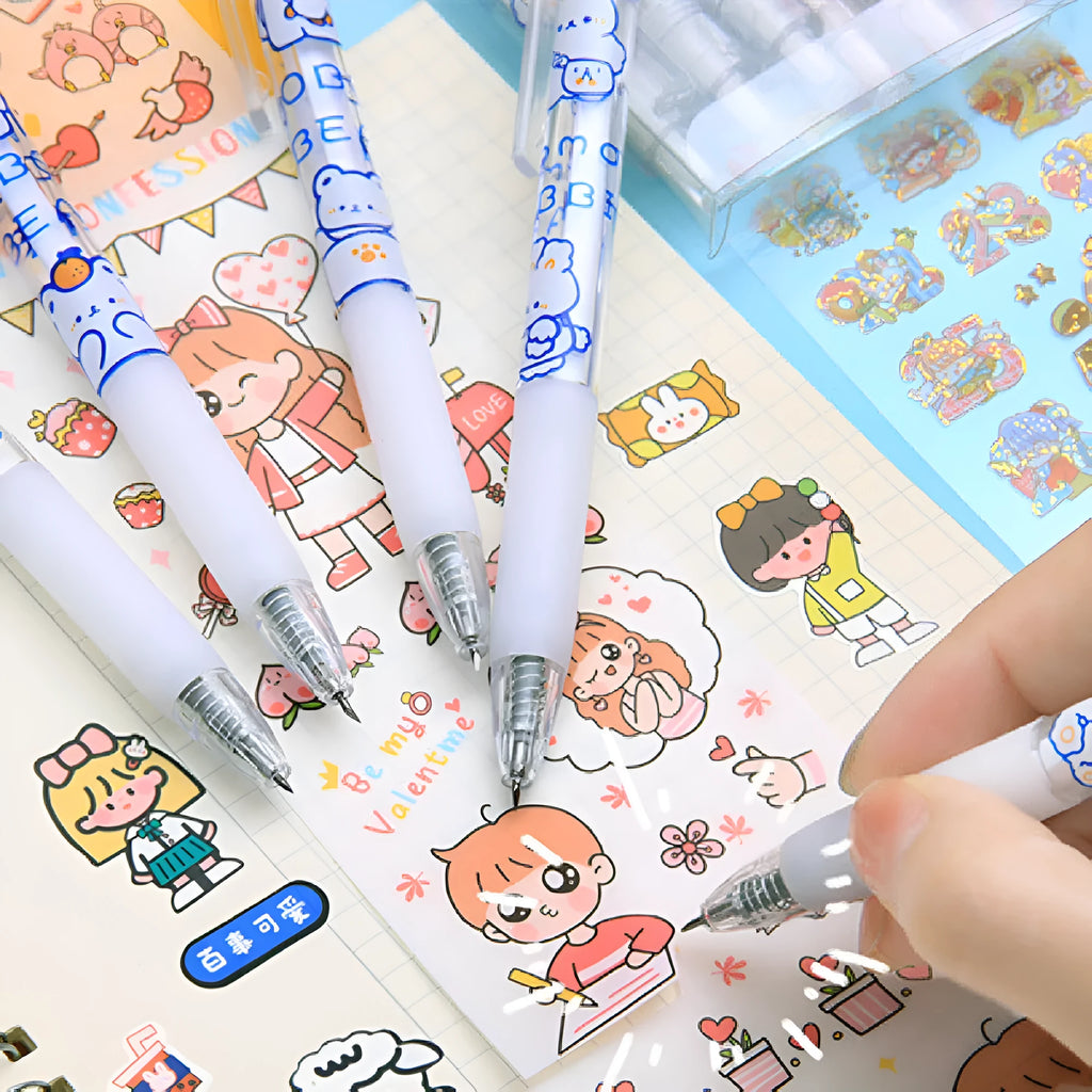 Pack of six cute bear and rabbit-shaped manual press pen knives for paper crafting and scrapbooking.
