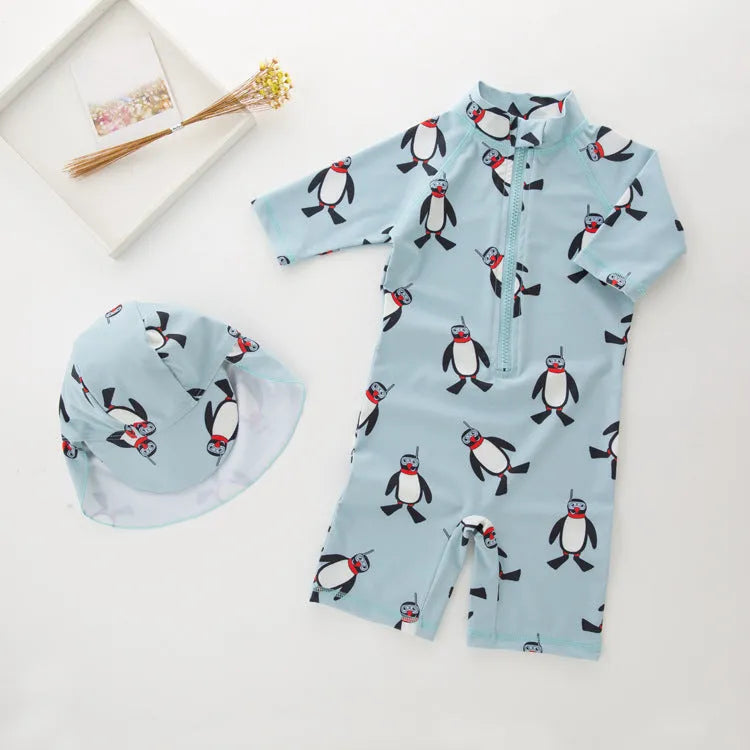 Boy's penguin print long sleeve one-piece swimsuit with matching swimming cap set
