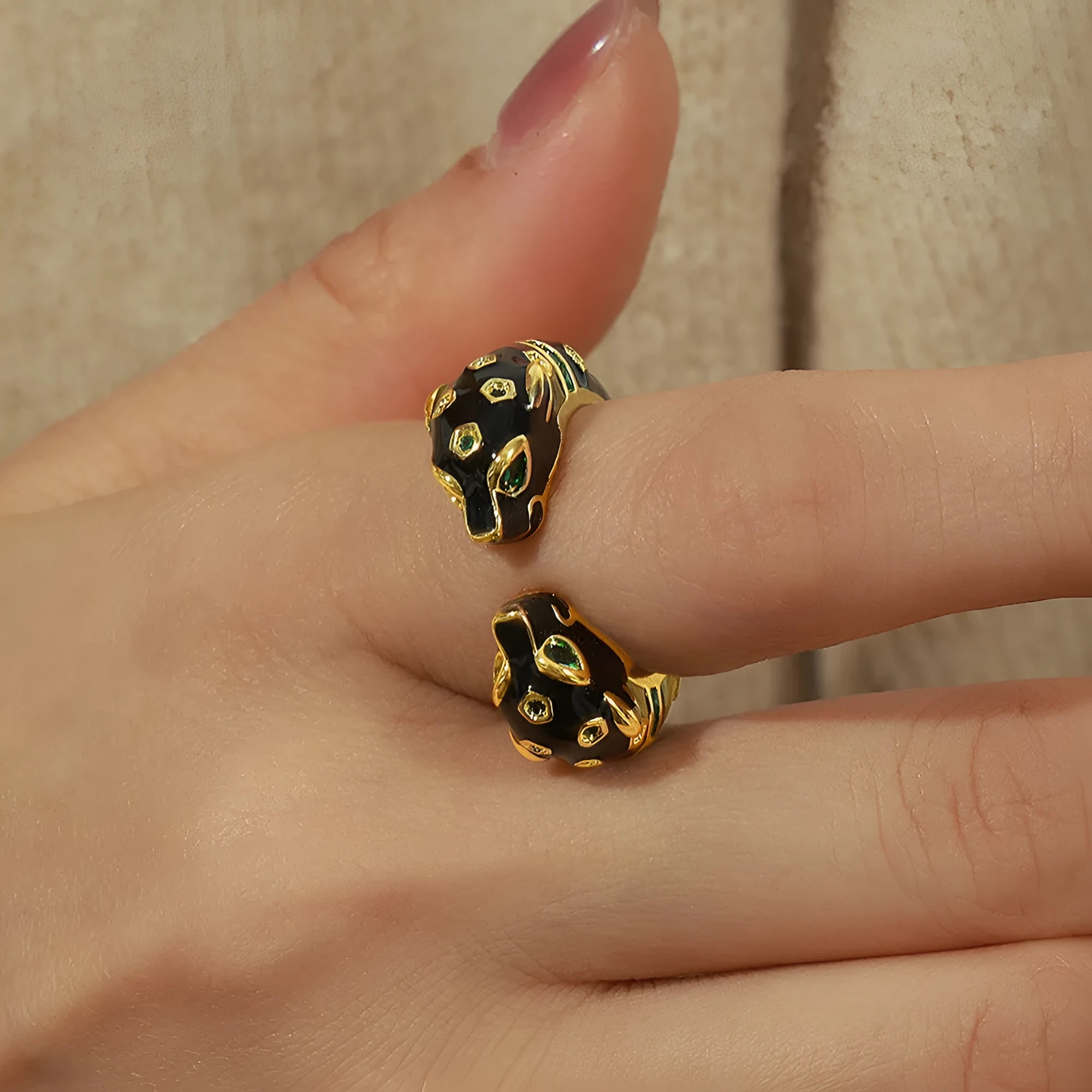 Women's geometric open ring with black electroplated cheetah drip pattern design, size 7