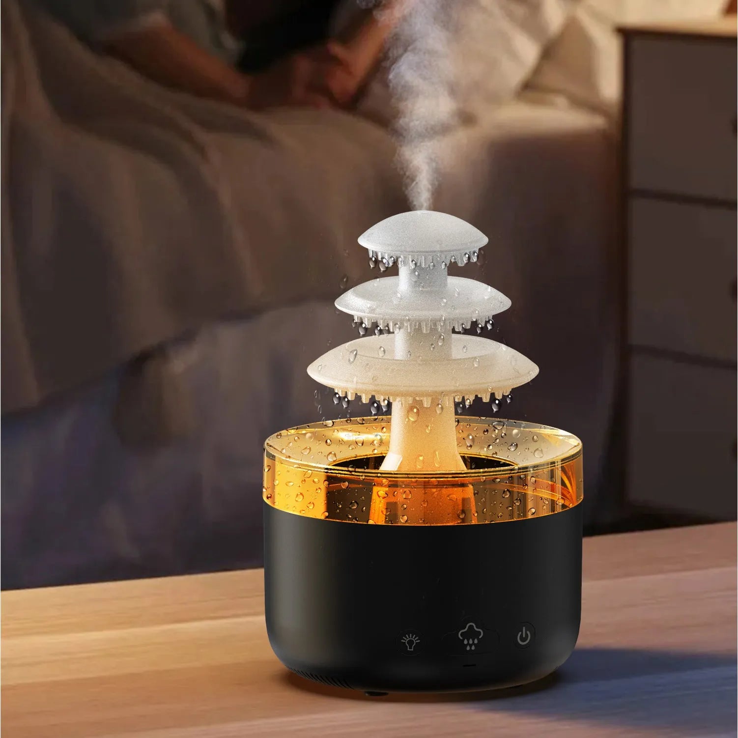 White cloud rain humidifier and essential oil diffuser with LED mood lighting on table