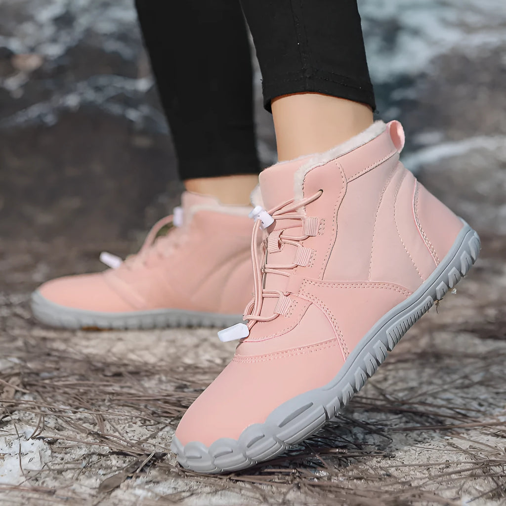 Waterproof fleece-lined snow boots with lace-up front and rubber non-slip sole.