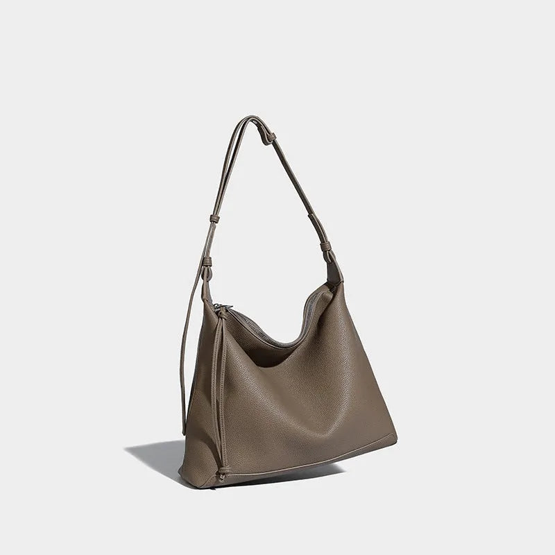 Caramel coloured soft PU messenger bag with underarm shoulder strap