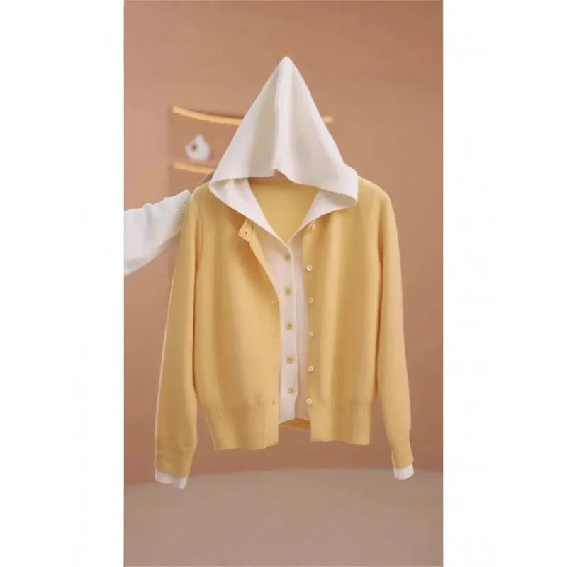 Women's long sleeve knit cardigan in pink with false two-piece design and colour contrast