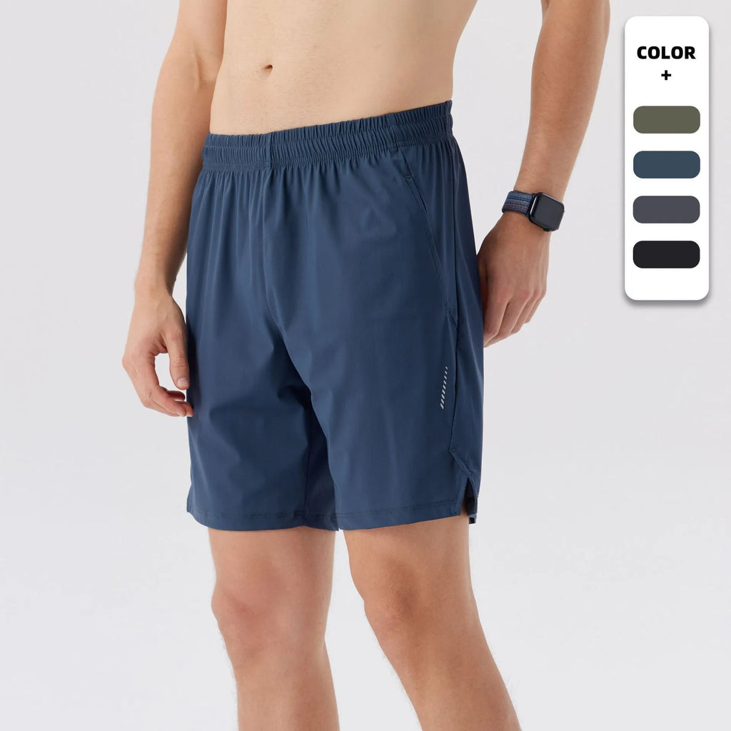 Man wearing black ice silk nylon sports shorts with mid waist and short length design