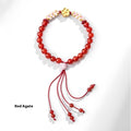 Hand-woven red rope bracelet with diamond-shaped crystal peach blossom charm in Chinese style
