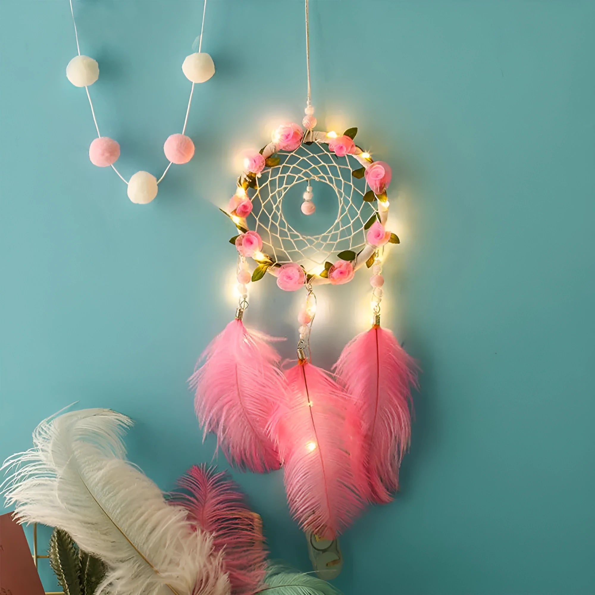 Pink dreamcatcher wind chime with ostrich feather ornaments, 10cm diameter wall decoration