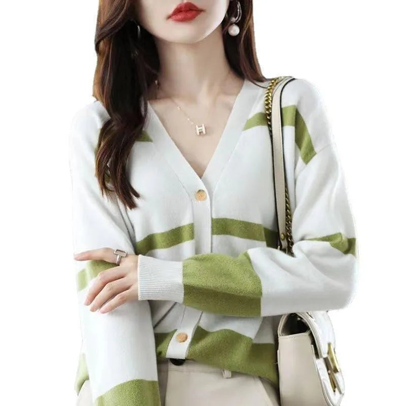 Women's slim fit striped V-neck knitted cardigan in a 3D pattern on a hanger.