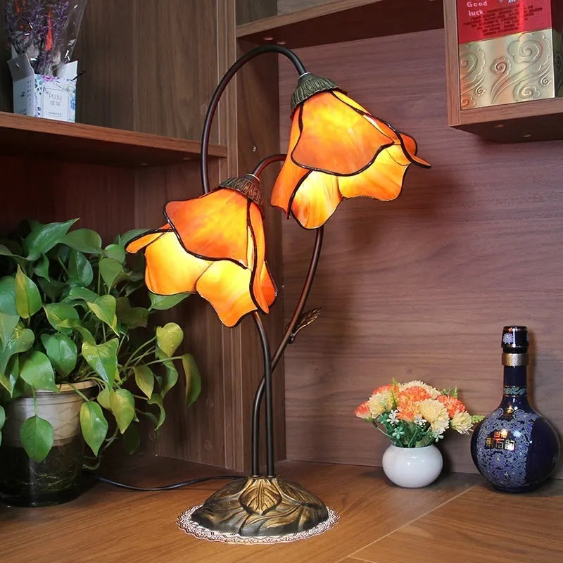 American classical desk lamp with lotus design in glass construction, available in single and double-head configurations