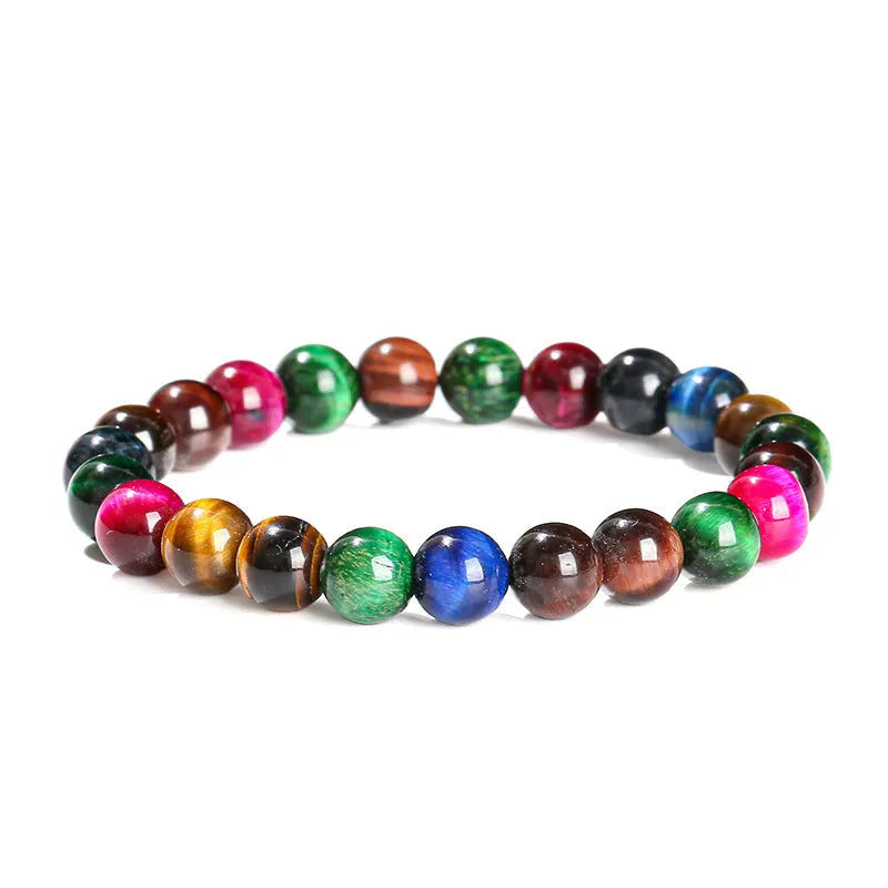 Colourful Tigereye stone bracelet with round beads on a mixed string, showing natural stone variations.