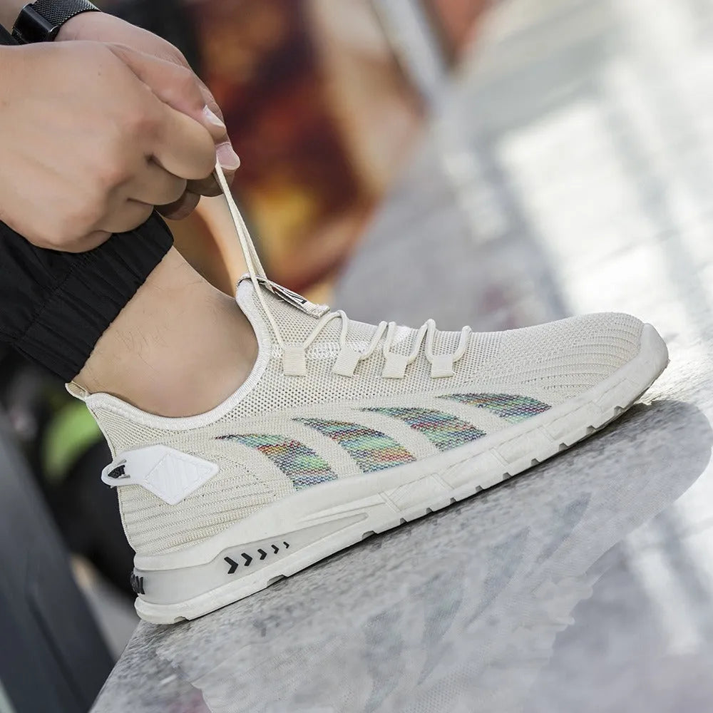 Lightweight low-top sneaker in mesh with stripe pattern and flat plastic sole.