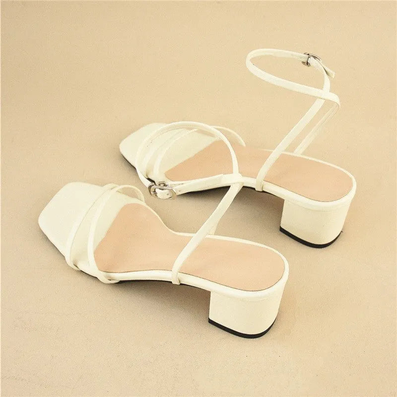 Beige women's square-toe sandals with a stiletto chunky heel and ankle buckle.