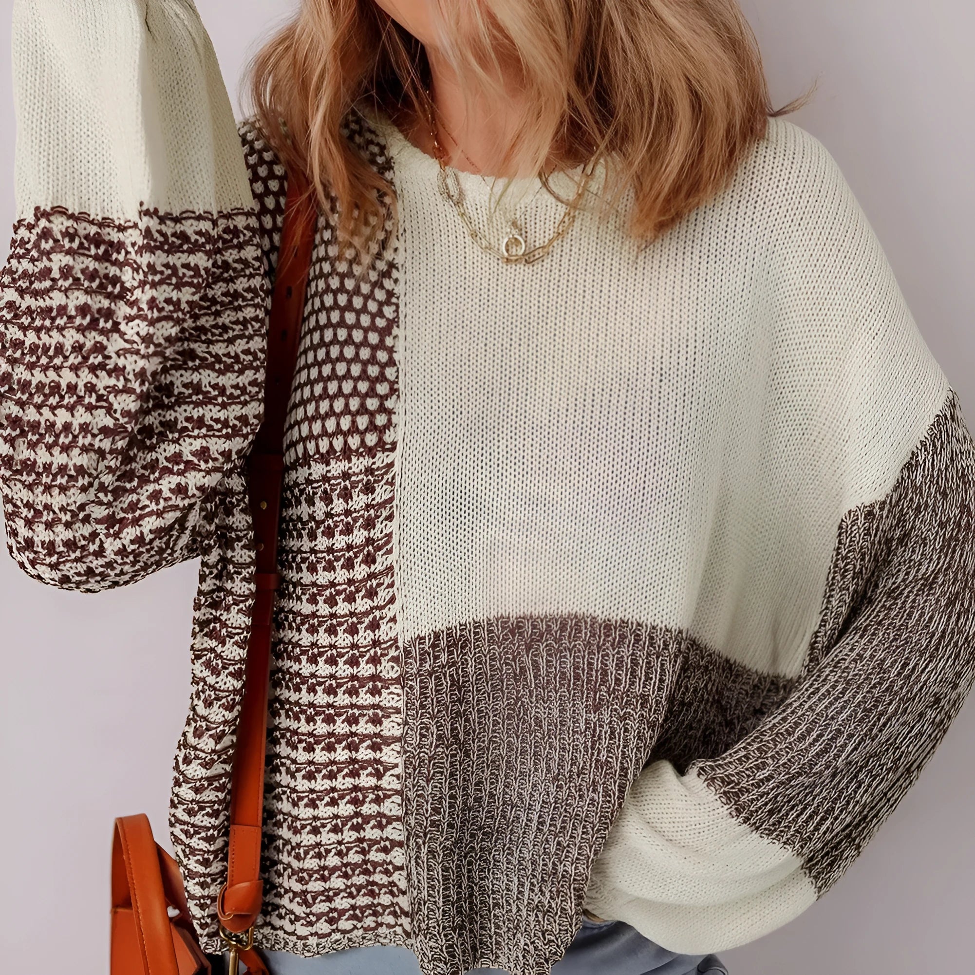 Dark khaki colour block women's loose knit sweater with a back tie and drop shoulders.