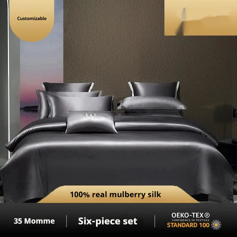 Silk solid colour four-piece quilt cover set shown in Champagne Gold on a bed