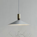 Minimalist single-headed round iron table lamp shown in black, 42cm diameter, hanging above a dining table