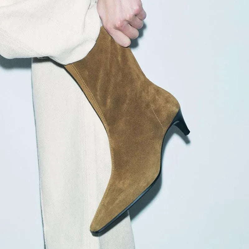 Women's brown square toe ankle boots with a side zipper and a mid-height kitten heel.