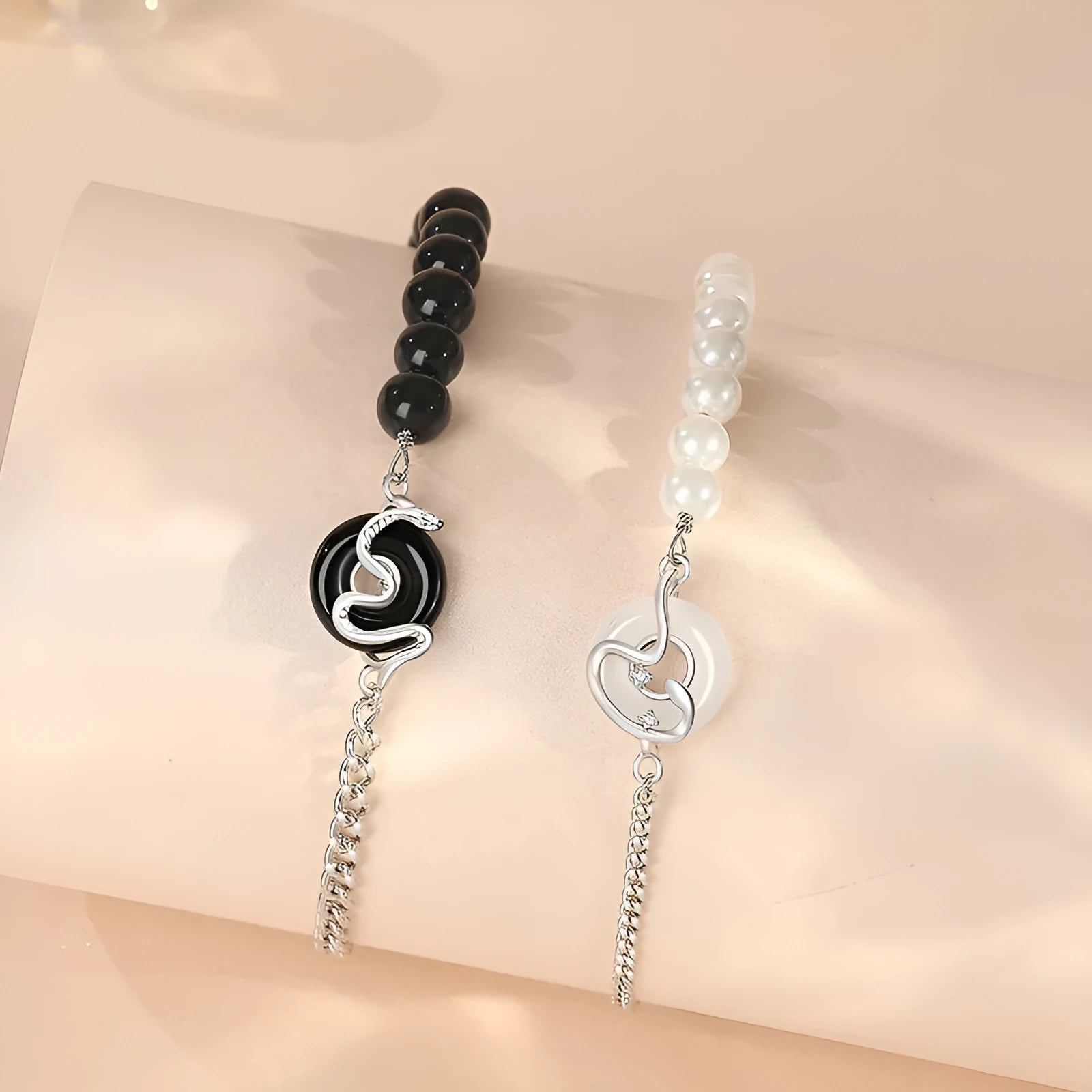 925 sterling silver couple bracelet with obsidian pearl, snake motif, and peace buckle clasp in New Chinese style.