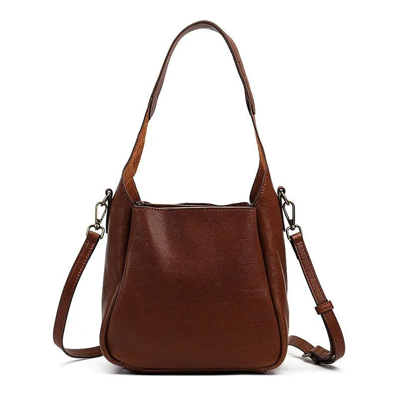 Solid colour women's cross-body bag in brown genuine first layer cowhide with sandwich pocket and single shoulder strap