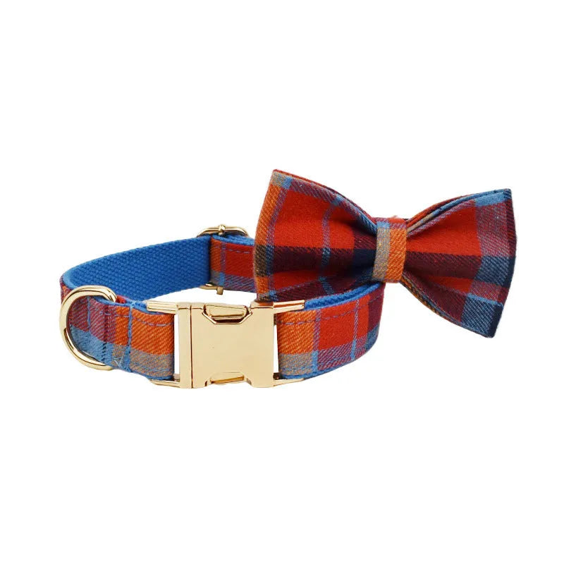 Blue velvet plaid cloth dog collar and matching leash set on a neutral background