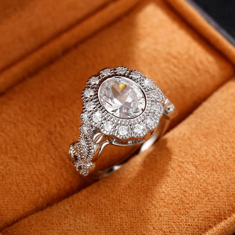 Women's geometric ring with round zircon centre stone and white gold colour plating