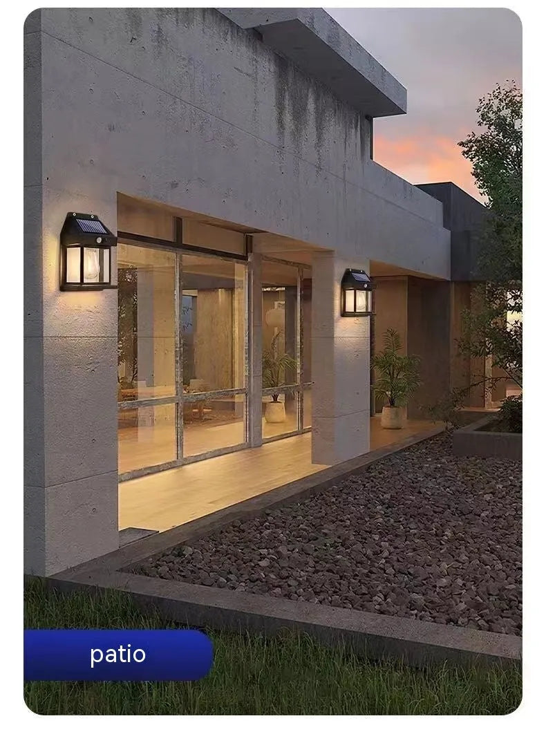 Solar tungsten wall lamp in black or white plastic with IP65 rating for outdoor garden and fence lighting