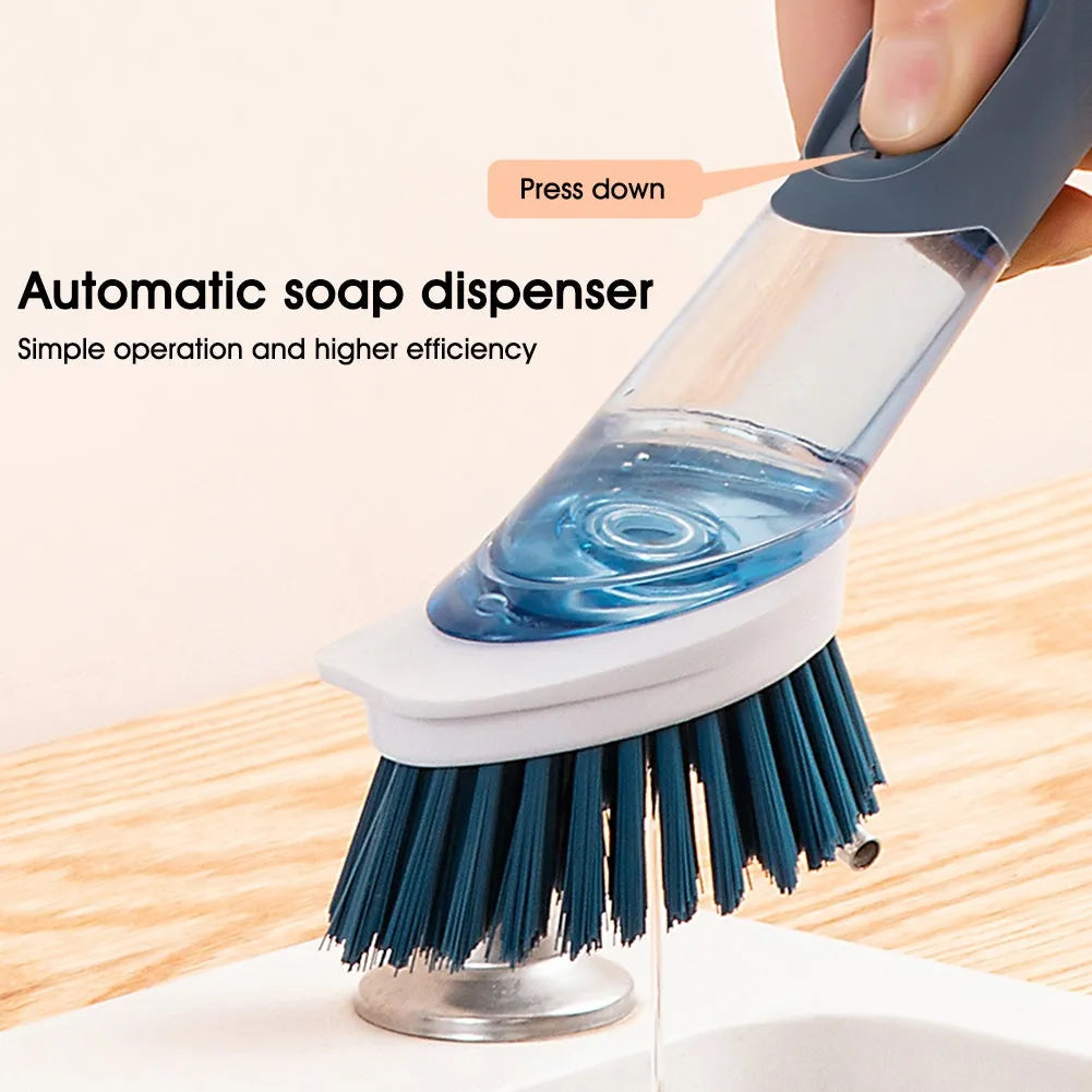Long-handle kitchen cleaning brush with sponge head and built-in soap dispenser button in blue.