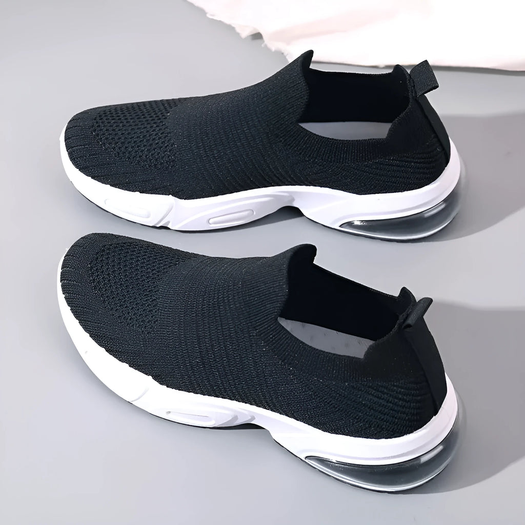 Breathable slip-on sock shoes in black, pink, khaki, and white colours with mesh lining and PVC sole.