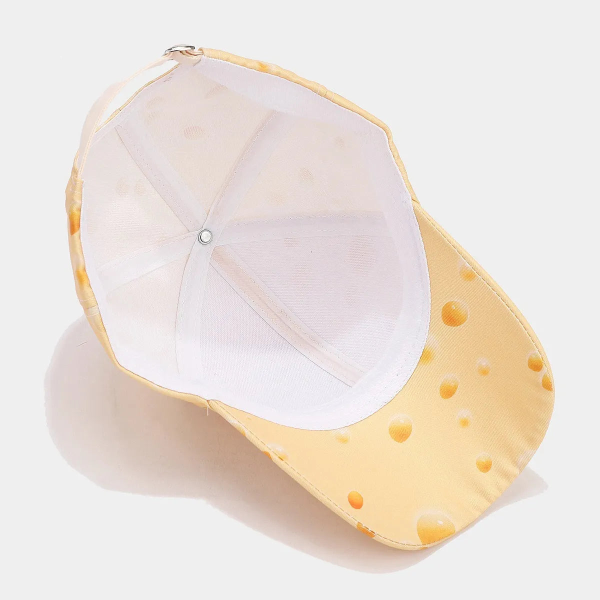 Cheese pattern printed peaked cap with adjustable strap and dome crown