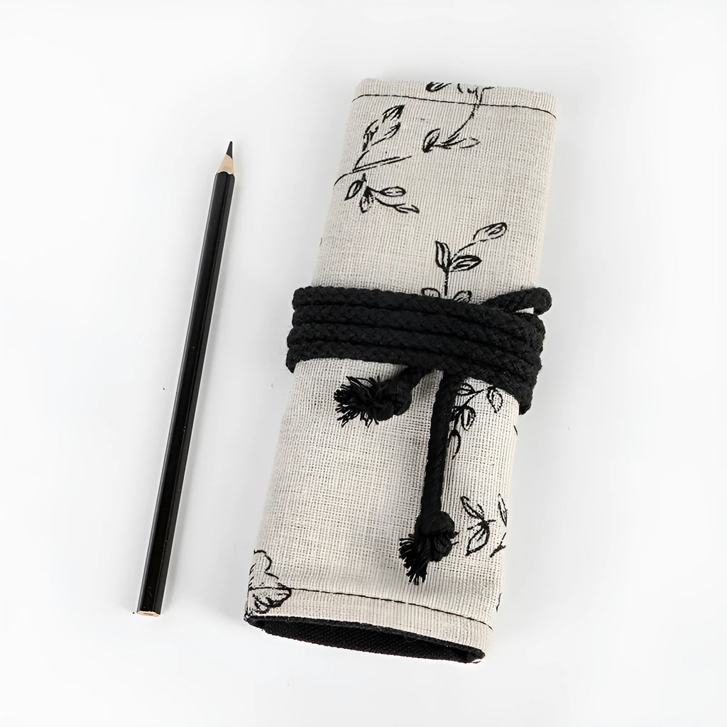 Black Peony printed canvas pencil roll bag unrolled showing 24 holes or 72 holes.