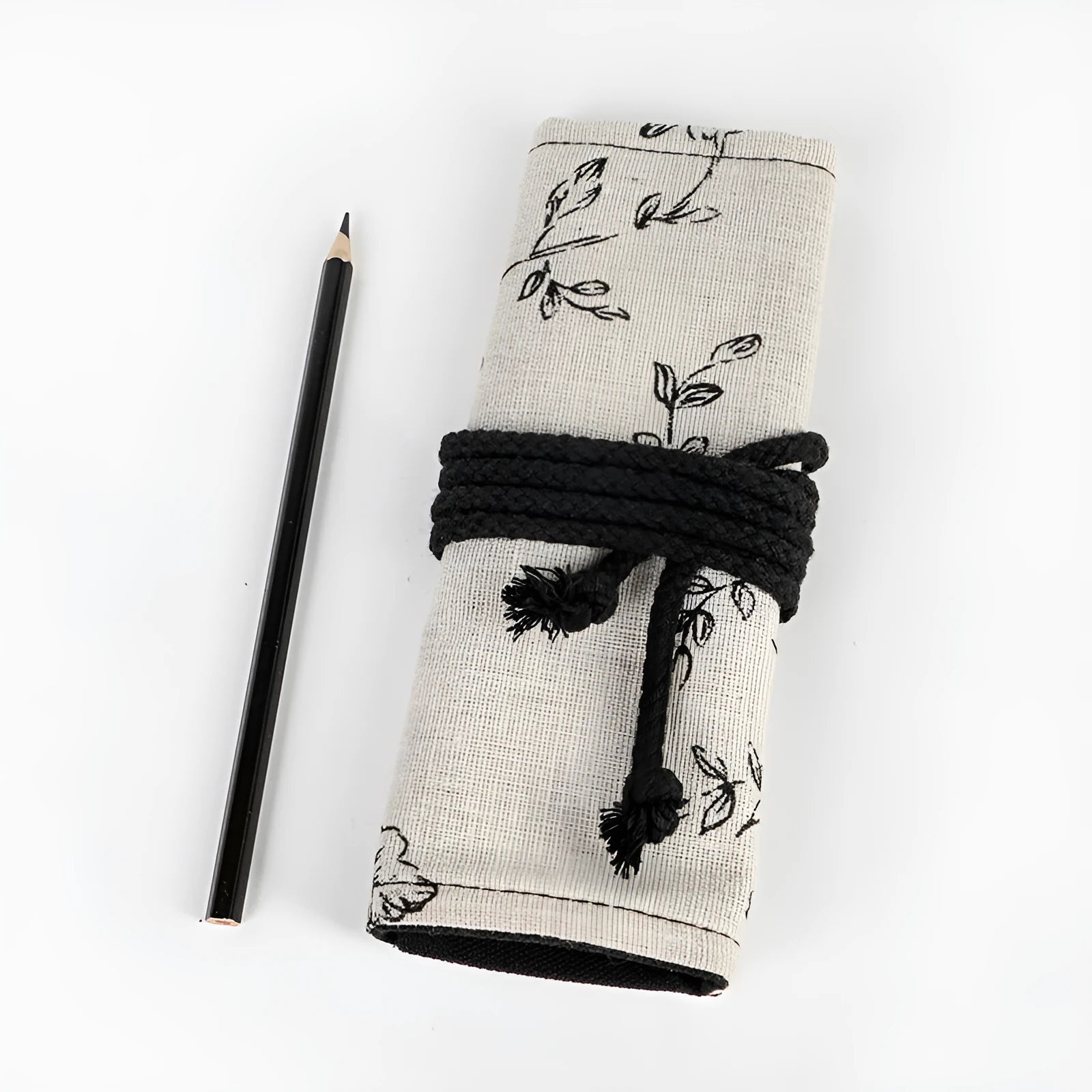 Black Peony printed canvas pencil roll bag unrolled showing 24 holes or 72 holes.