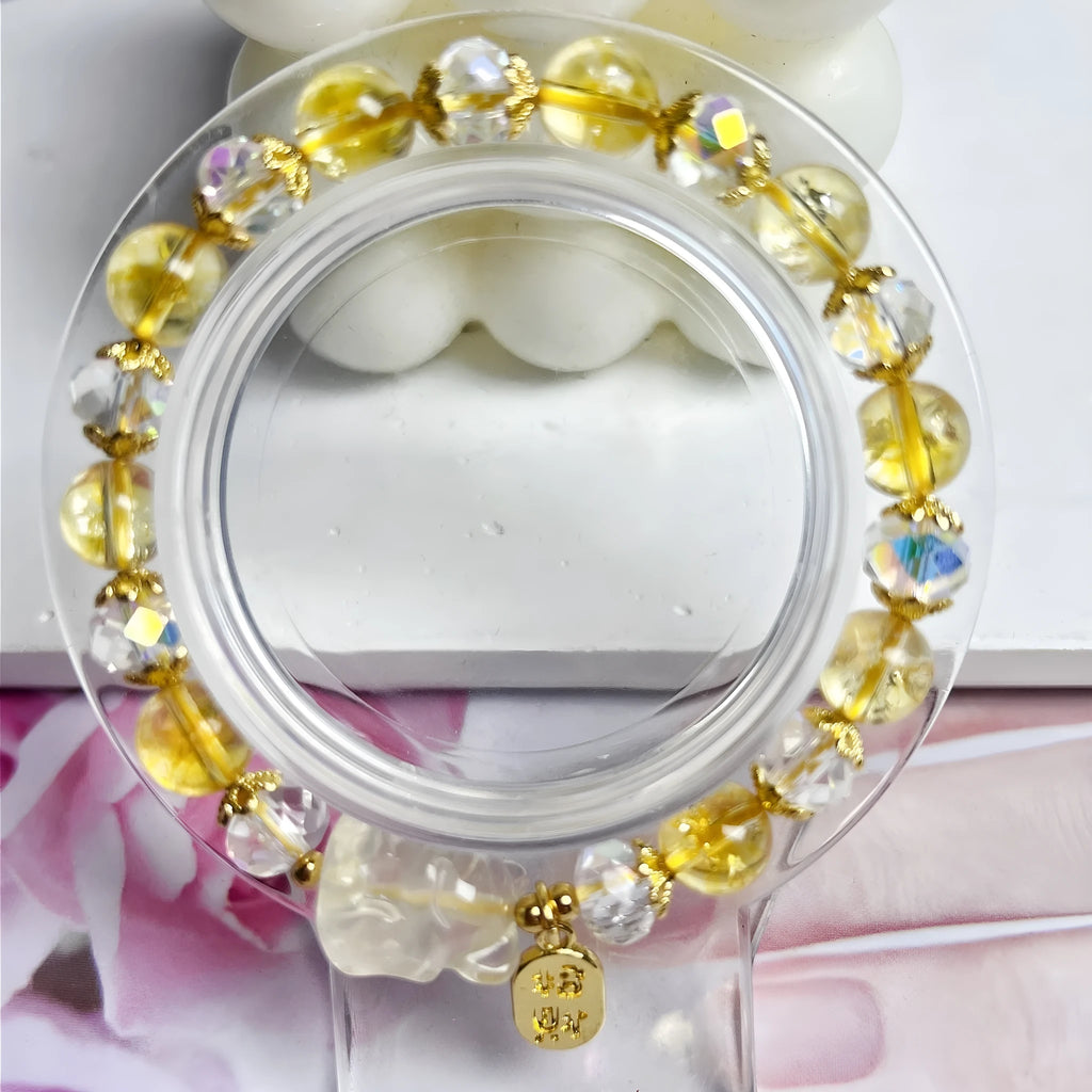 Natural citrine nine-tail fox crystal bracelet for women on a wrist.