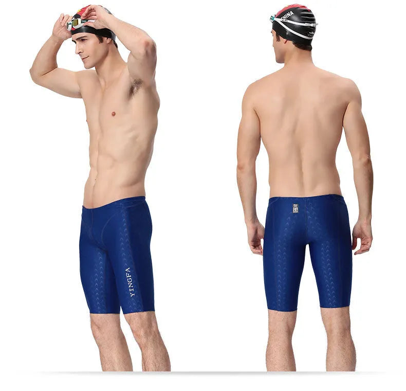 Kids race training swim trunks in black polyester spandex, front view, sizes XS to 3XL