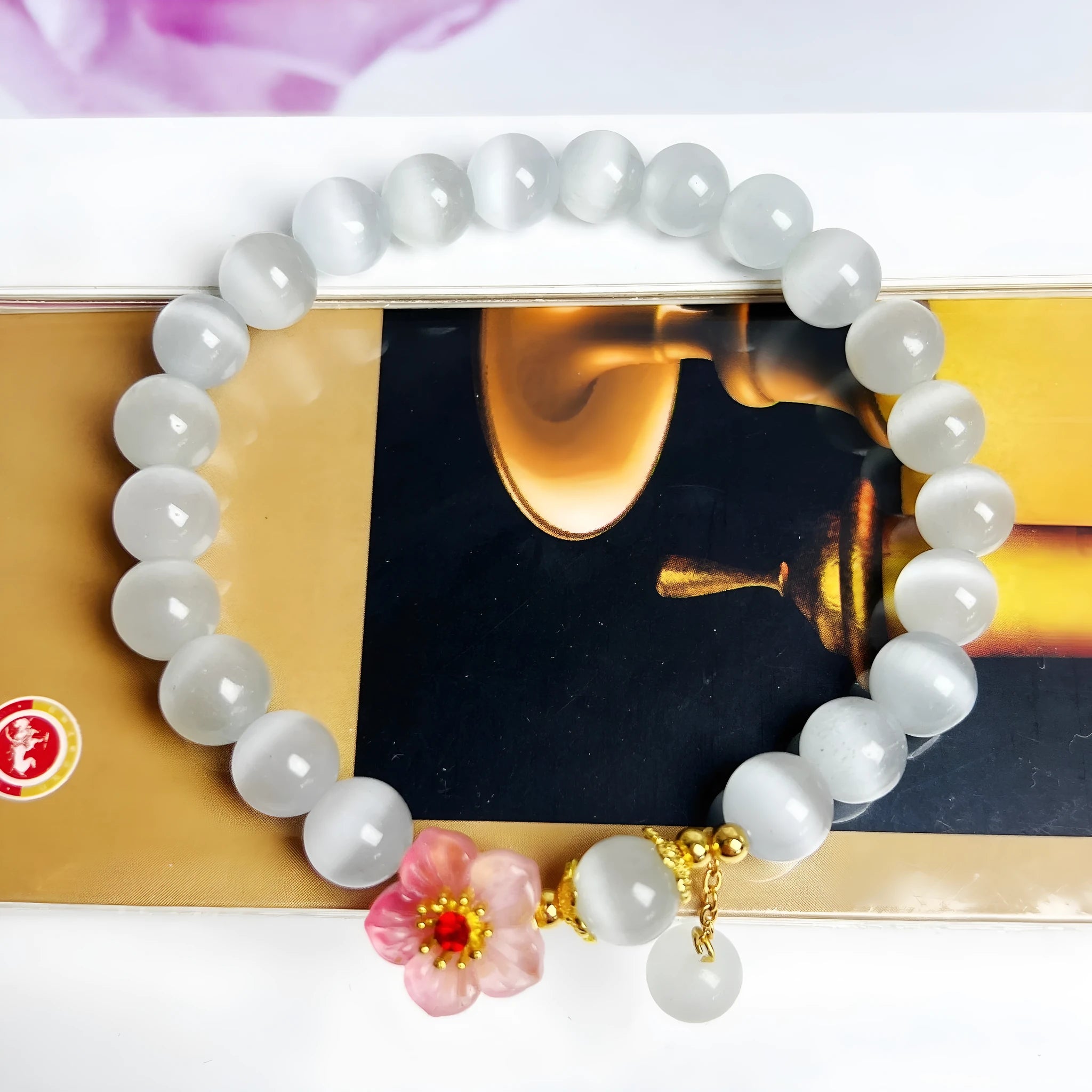 White Chinese-style opal flower beaded bracelet with glass and coloured glaze components