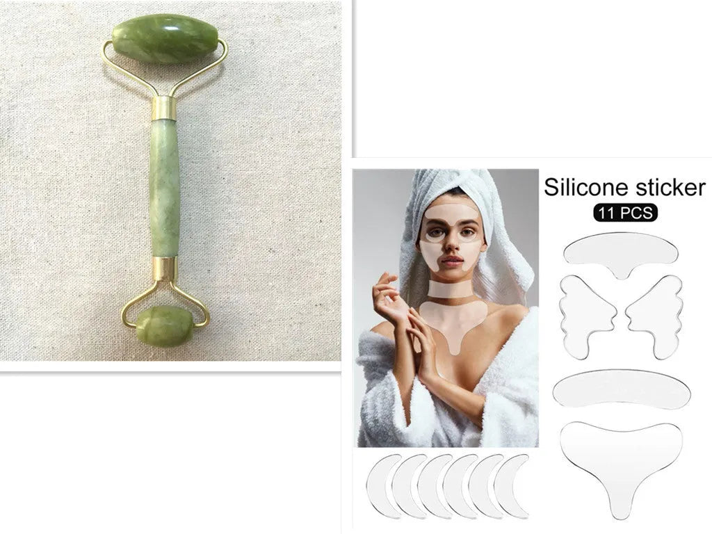 Double-end jade roller with natural Xiuyu stone, 14cm length, large 4.5cm wheel and small 2.2cm wheel on green background