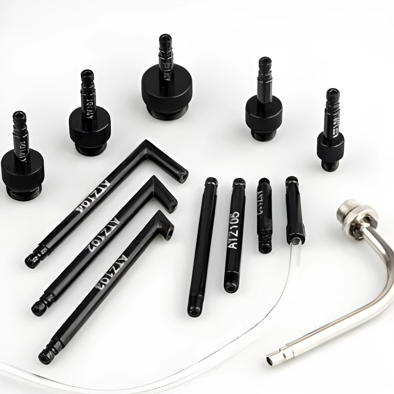 13-piece automatic transmission oil refuelling connector kit with various adaptors on a white background.