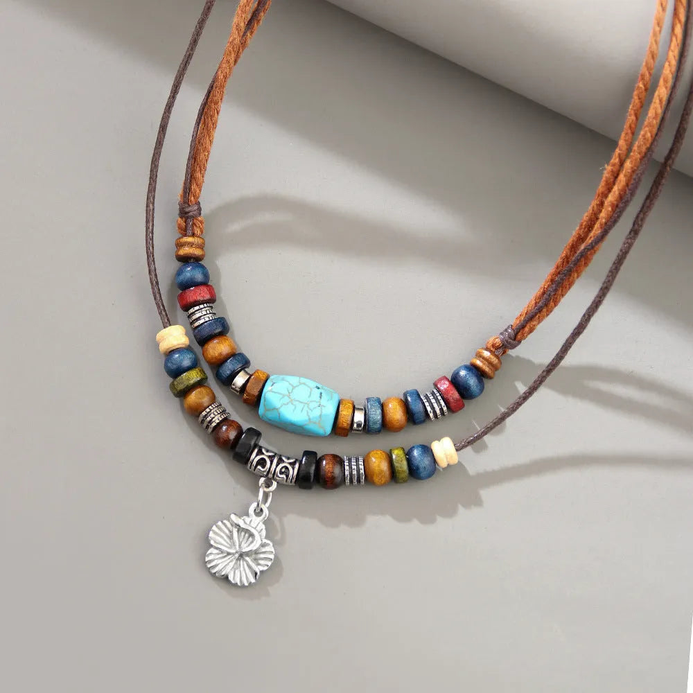 Men's geometric alloy pendant necklace with turquoise colour on wax rope chain