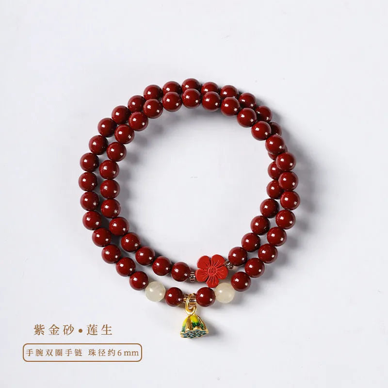 Close-up of a hand-woven double circle bracelet made with purple gold sand beads and a lotus seedpod charm.