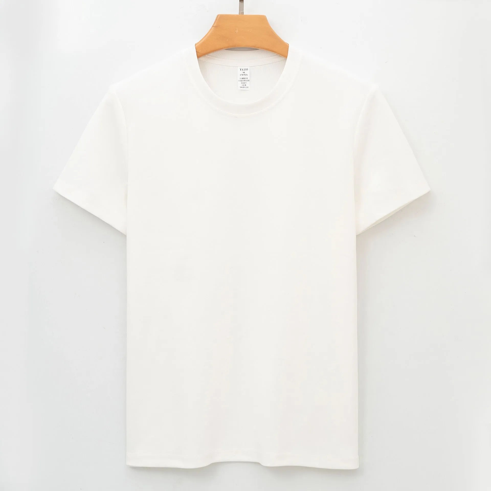 Men's solid colour short sleeve antibacterial quick-dry T-shirt on a hanger