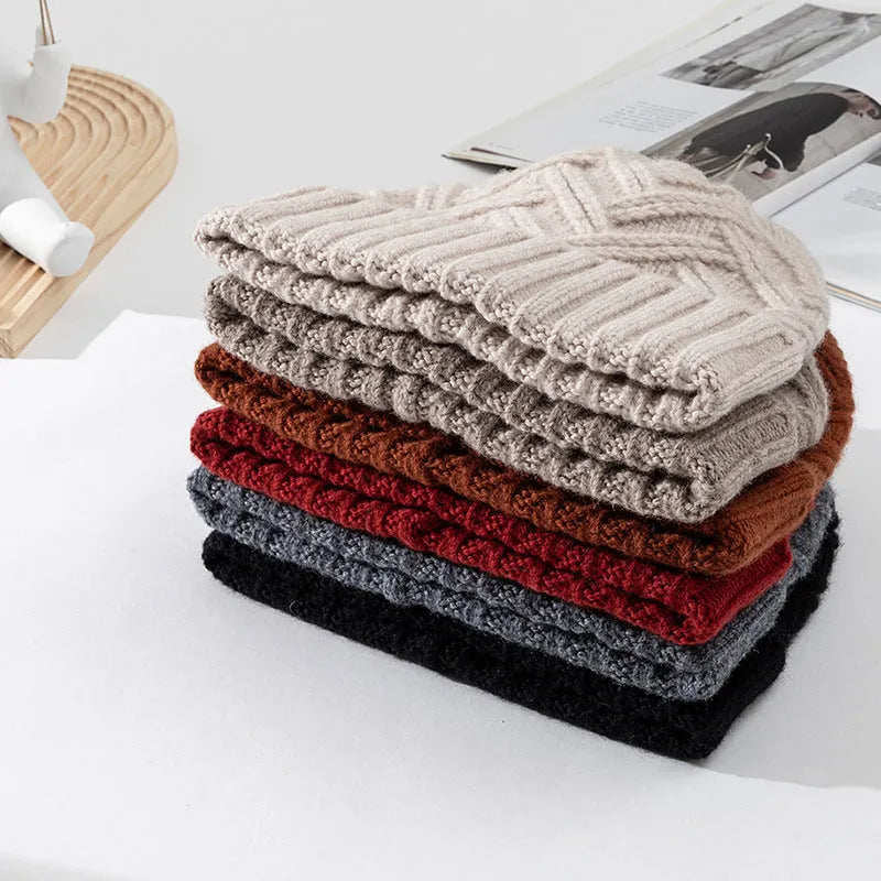 Wool knitted women's hat with dome crown in one of six colours: ivory white, khaki, red, brown, grey, or black.