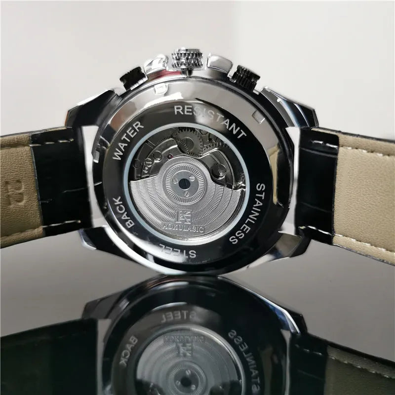 Men's automatic mechanical watch with multifunction display on wrist, showing natural silver case option.