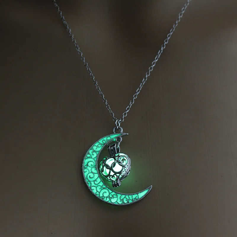 Glowing pendant necklace with silver plated chain, 50 cm length, luminescent pendant in white K plating