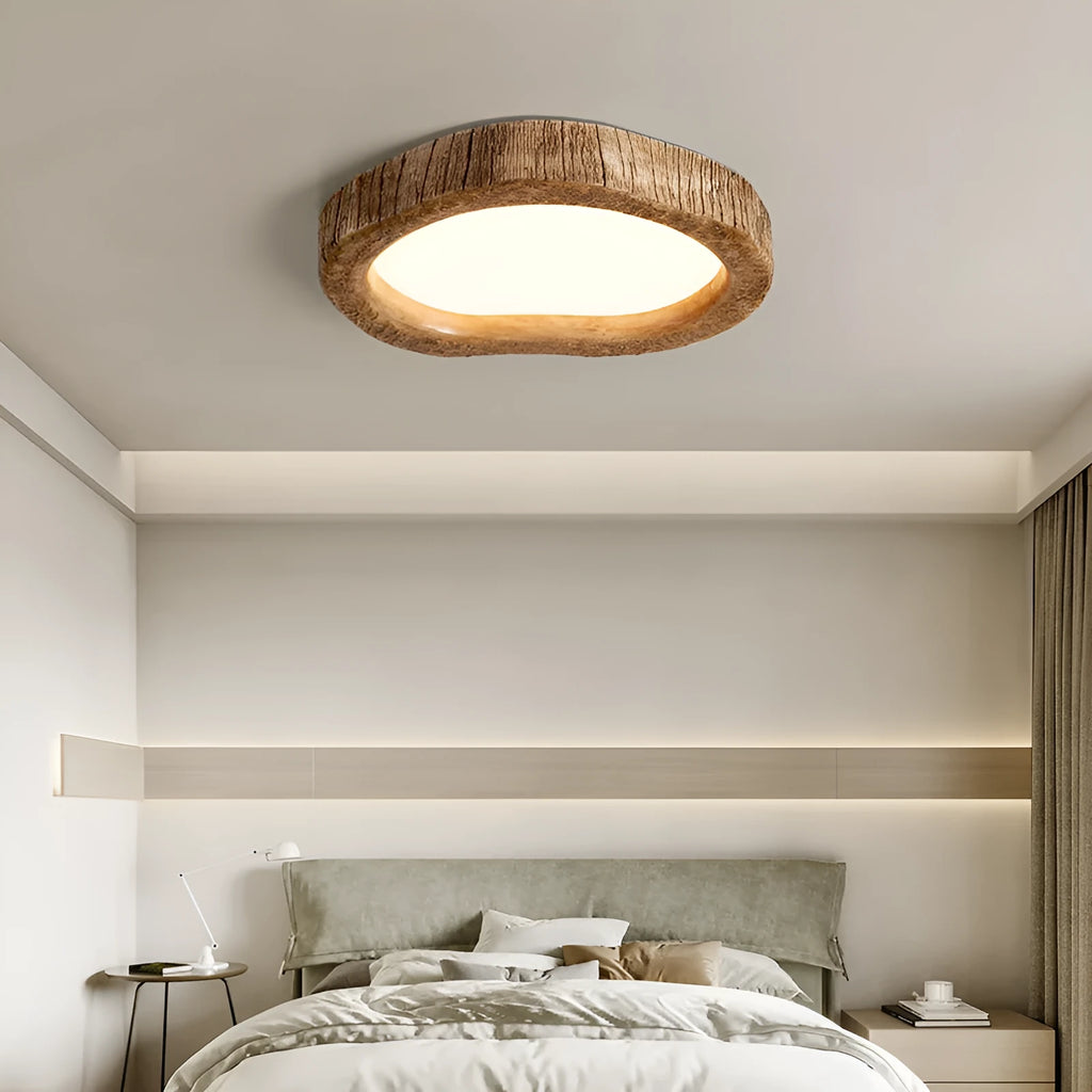 Wood grain finish round Chinese style LED ceiling lamp for bedroom illumination.