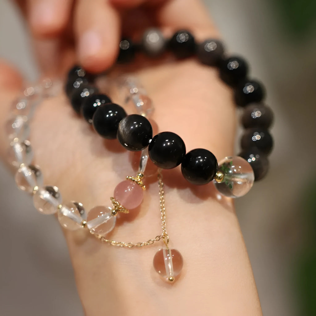 White crystal and cat eye obsidian geometric bracelet with Chinese auspicious patterns