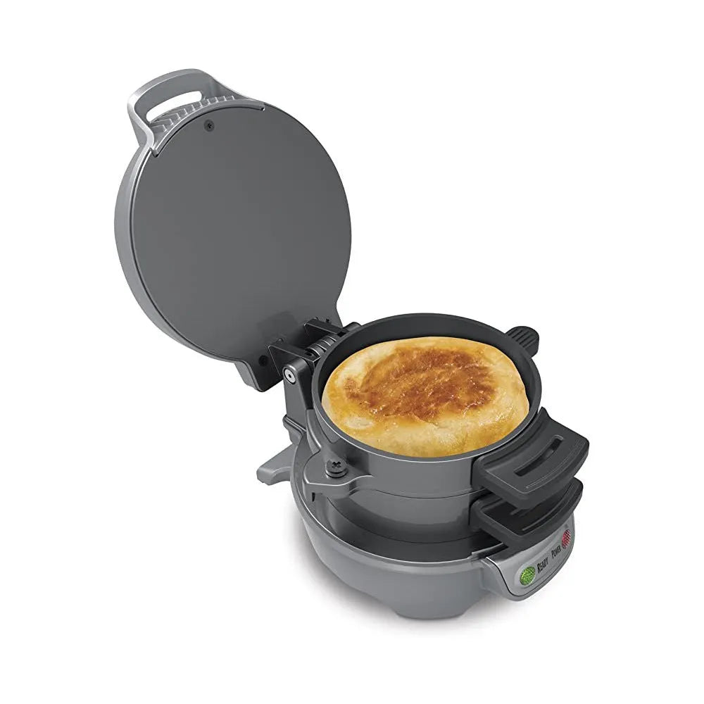 Bright red household breakfast machine sandwich toaster with egg cooker ring on a kitchen counter.