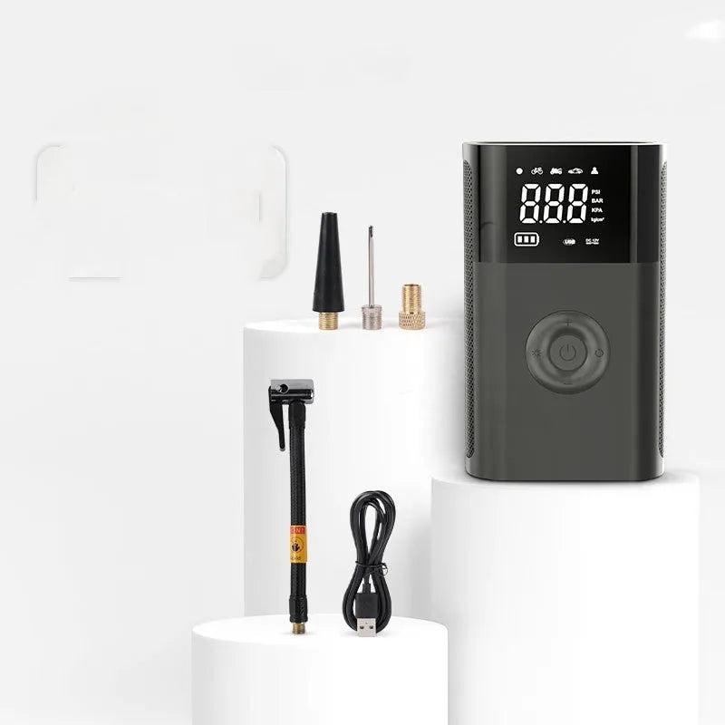 Wireless handheld digital air pump with pressure display and multiple nozzle attachments for tyres and inflatables