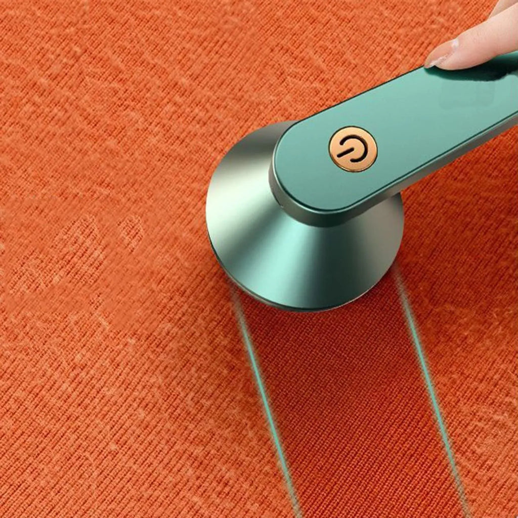 White or green USB rechargeable electric lint remover with a removable lint collection container